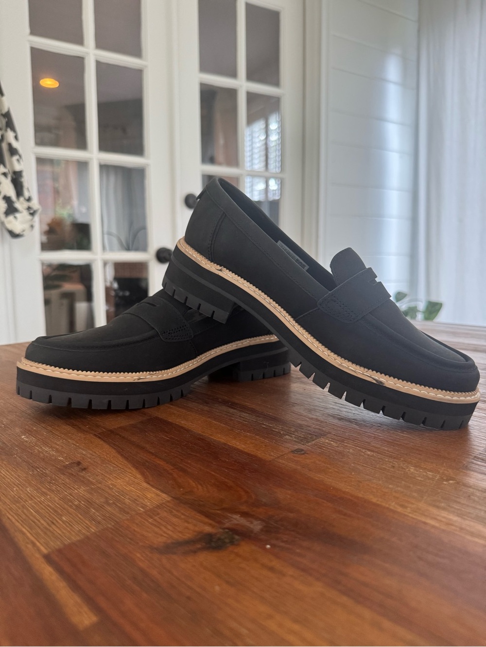 Toms Black Lug Sole Penny Loafers with Tan Welt